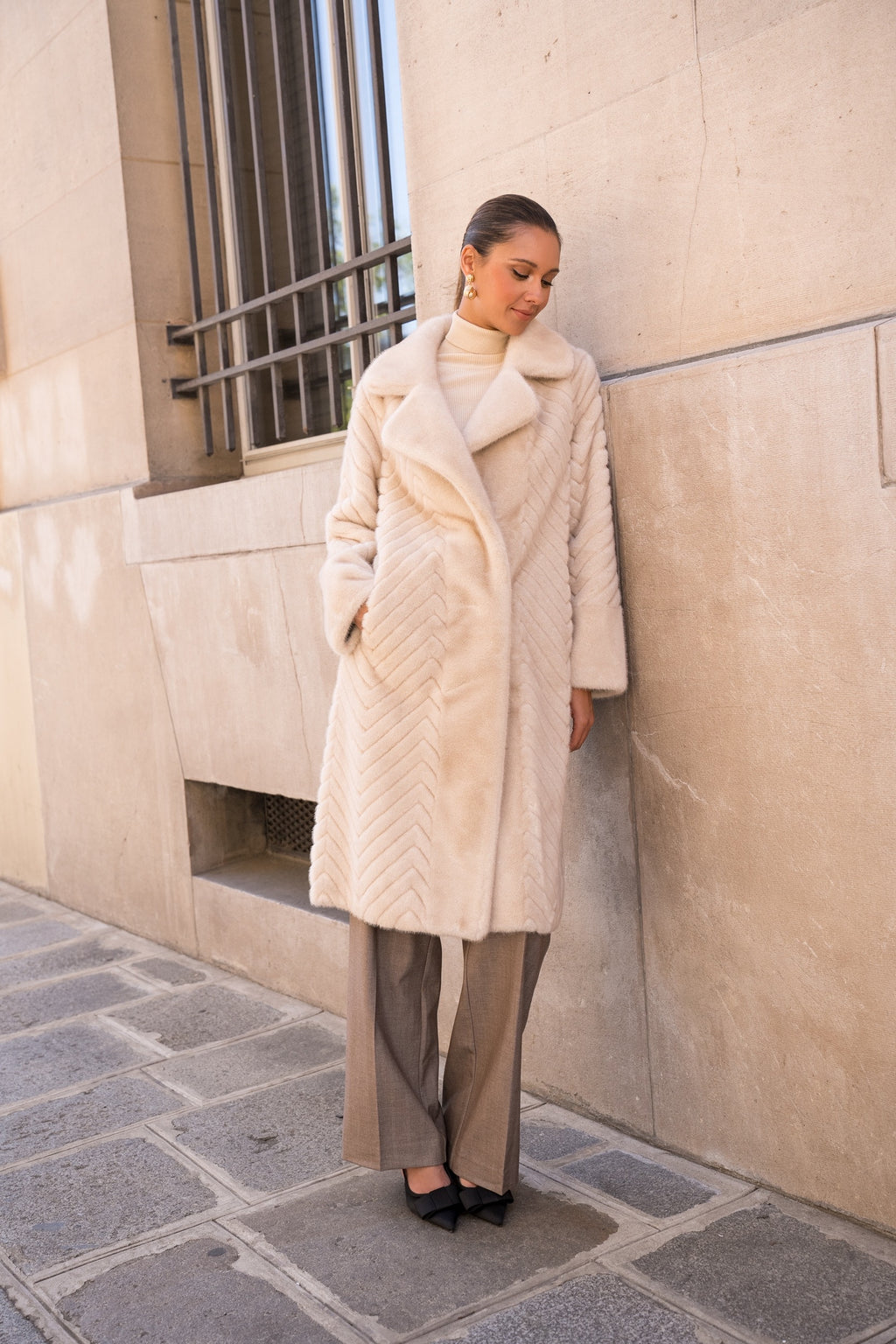 Manteau fausse fourrure