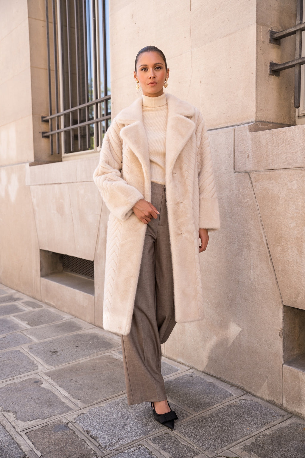 Manteau fausse fourrure